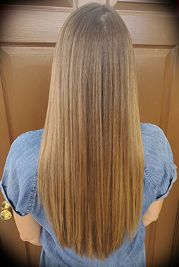Home 12 Hair cuts and Brazilian Blowout at Beauty Bar Hair Salon